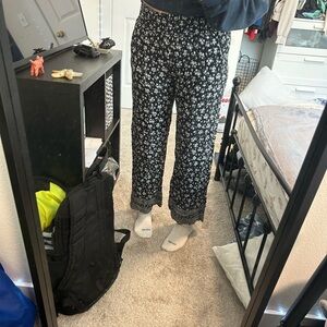 COPY - flown dress pants with a ruffled waist line. Size small.